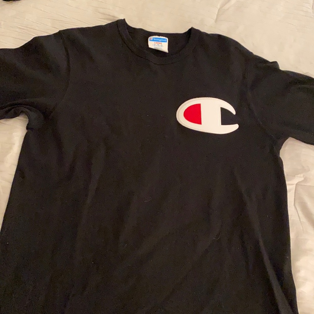 Two large men’s champion t shirts black and white